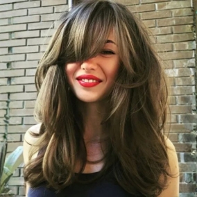 Haircuts Service side swept haircuts with bangs